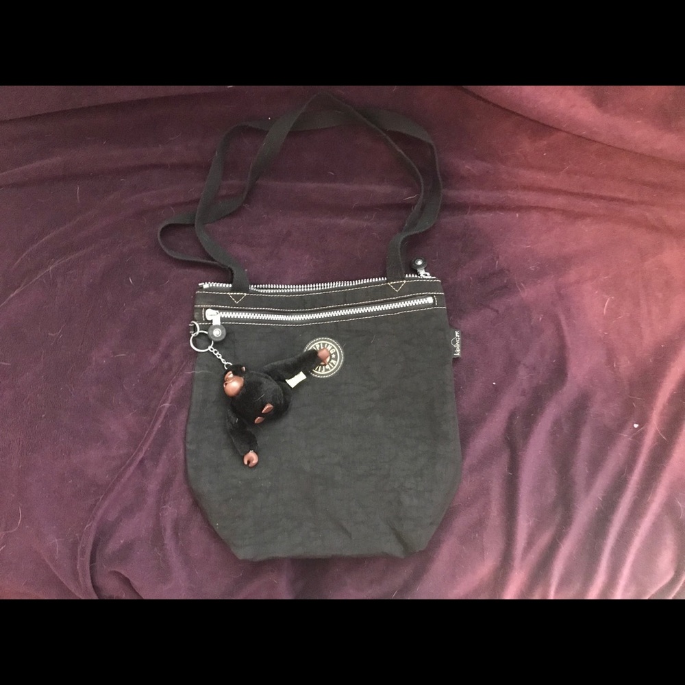 Kipling black tote bag with tan interior